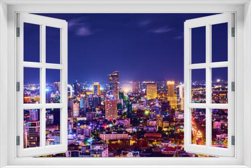 Fototapeta Naklejka Na Ścianę Okno 3D - city skyline at night phnom penh capital of cambodia