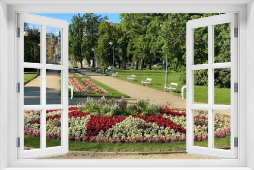 Fototapeta Naklejka Na Ścianę Okno 3D - Garden with flowers