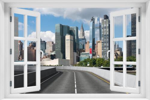 Fototapeta Naklejka Na Ścianę Okno 3D - Empty urban asphalt road exterior with city buildings background. New modern highway concrete construction. Concept of way to success. Transportation logistic industry fast delivery. New York. USA.