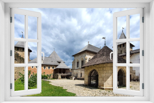 Fototapeta Naklejka Na Ścianę Okno 3D - Inner courtyard of a medieval old castle. Khotyn fortress