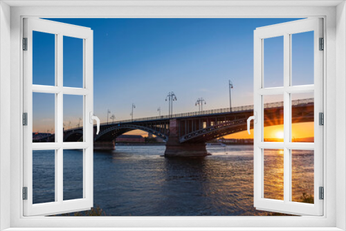 Fototapeta Naklejka Na Ścianę Okno 3D - View of the Theodor-Heuss Bridge over the Rhine near Wiesbaden/Germany at sunset