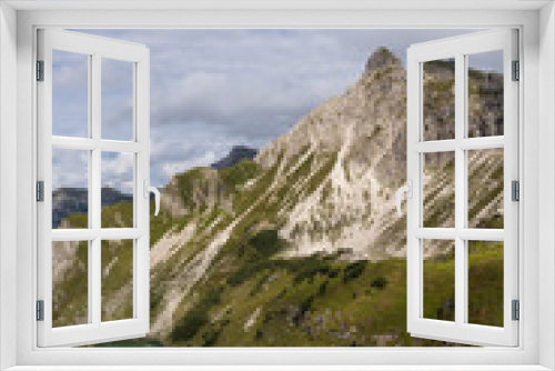 Fototapeta Naklejka Na Ścianę Okno 3D - Sun-kissed mountain in the Alps