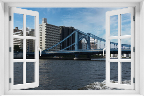 Fototapeta Naklejka Na Ścianę Okno 3D - Scenery seen from the Sumida River in Tokyo River and bridge