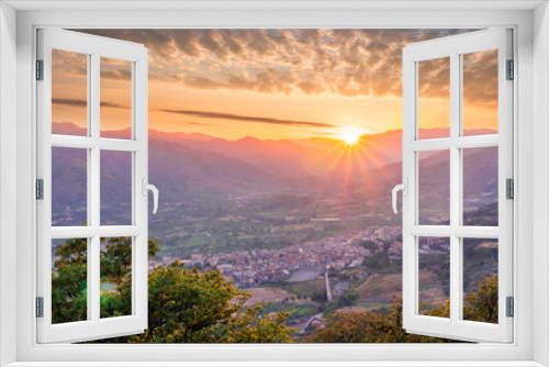 Fototapeta Naklejka Na Ścianę Okno 3D - graet highland landscape with scenic view from mountain to below to a walley with majectic mountains and scenic cloudy sunset on background
