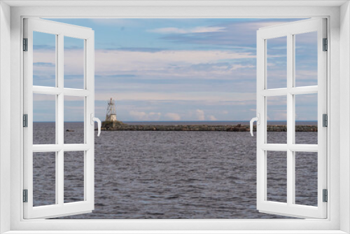 Fototapeta Naklejka Na Ścianę Okno 3D - Russia. Leningrad region. May 29, 2022. Lighthouse at the exit to Lake Ladoga from Vladimir Bay.
