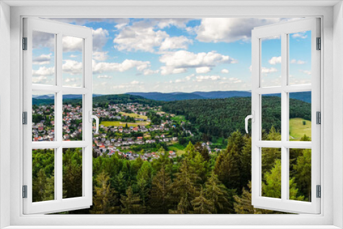 Fototapeta Naklejka Na Ścianę Okno 3D - Panoramic view of the hilly landscape near Wilhelmsfeld, in Baden-Württemberg. Green nature with mountains and forests.
