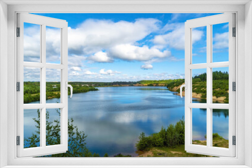 Fototapeta Naklejka Na Ścianę Okno 3D - On the shore of the Pugarevsky quarry . Summer landscape. Leningrad region. Vsevolozhsk.