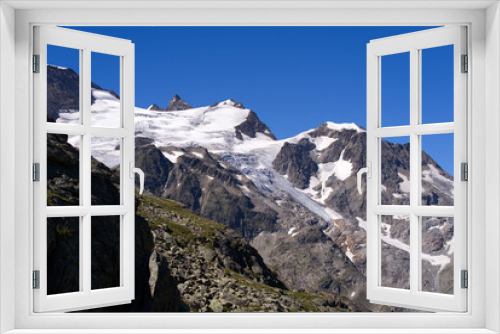 Fototapeta Naklejka Na Ścianę Okno 3D - Beautiful scenic view of mountain panorama with Stone Glacier at Swiss mountain pass Susten on a sunny summer day. Photo taken July 13th, 2022, Susten Pass, Switzerland.