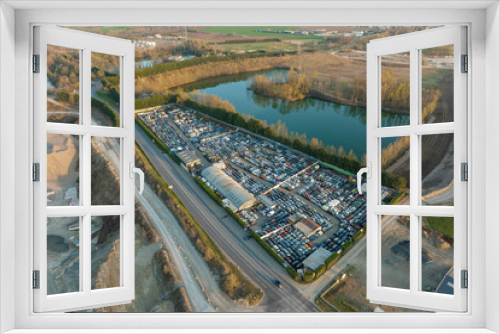 Fototapeta Naklejka Na Ścianę Okno 3D - Aerial view of big parking lot of junkyard with rows of discarded broken cars. Recycling of old vehicles