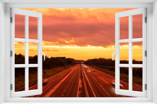 Fototapeta Naklejka Na Ścianę Okno 3D - M1 motorway at sunset in England. United Kingdom