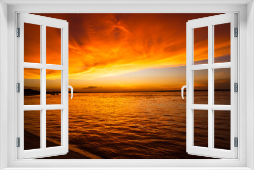 Fototapeta Naklejka Na Ścianę Okno 3D - Beautiful  Scenic View Of Sea Against Orange Sky