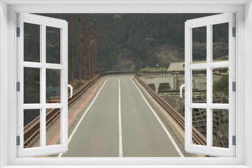 Fototapeta Naklejka Na Ścianę Okno 3D - Straight road bridge