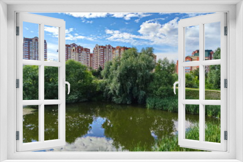 Fototapeta Naklejka Na Ścianę Okno 3D - Summer mirrors of the city pond