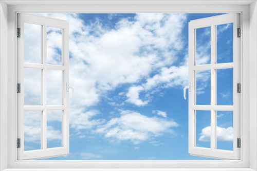 Beautiful clouds during spring time in a Sunny day. Blue sky and white fluffy clouds