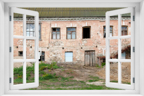 Fototapeta Naklejka Na Ścianę Okno 3D - Front view of an abandoned building 