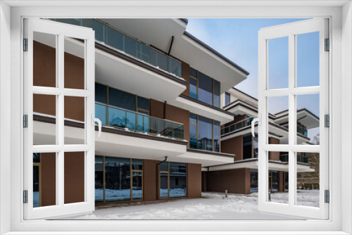 Fototapeta Naklejka Na Ścianę Okno 3D - Modern exterior of new luxury residential building at winter.