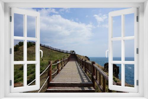 Fototapeta Naklejka Na Ścianę Okno 3D - seaside walkway and clouds