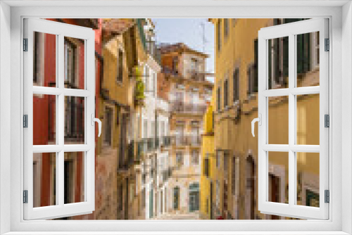 Fototapeta Naklejka Na Ścianę Okno 3D - Colorful narrow street in Lisbon, Portugal