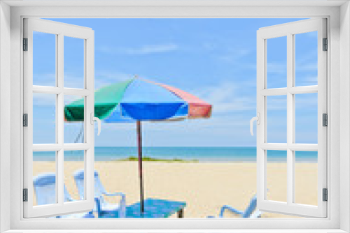 Fototapeta Naklejka Na Ścianę Okno 3D - Sun shade with chairs at tropical beach