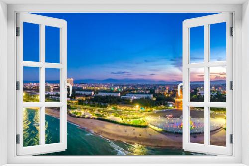 Fototapeta Naklejka Na Ścianę Okno 3D - Sunset at Nghinh Phong cape, Phu Yen, Vietnam, with square, beach, park, beautiful sunset sky. Nghinh Phong Is A New Symbol Of Phu Yen