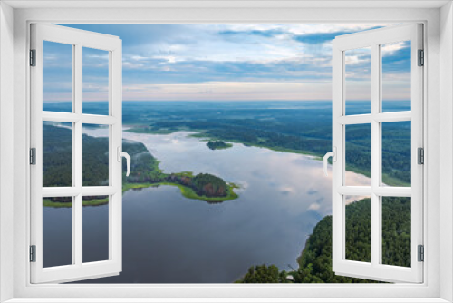 Fototapeta Naklejka Na Ścianę Okno 3D - Big lake with green shores with morning fog in dawn, aerial landscape. Recreation concept. Aerial view