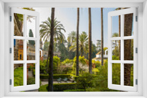 Fototapeta Naklejka Na Ścianę Okno 3D - Beautiful formal public garden inside Alcazar Seville palace in summertime in Andalusia
