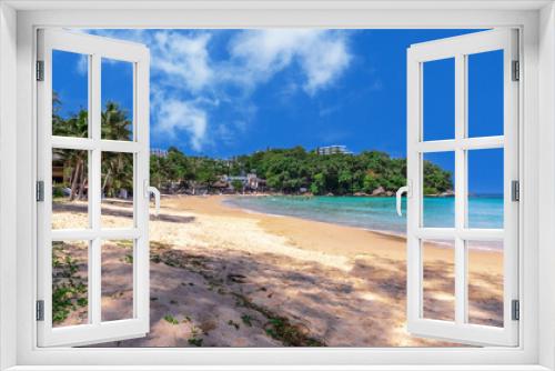 Fototapeta Naklejka Na Ścianę Okno 3D - Colourful Skies Sunset over Kata Beach in Phuket Thailand. This Lovely island waters are turquoise blue waters, lush green mountains colourful skies and beautiful views of Pa Tong Patong