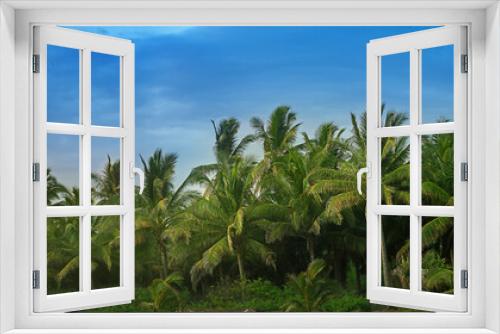 Fototapeta Naklejka Na Ścianę Okno 3D - Beautiful paradise coconut palm tree at sunset time - Holiday Vacation concept
