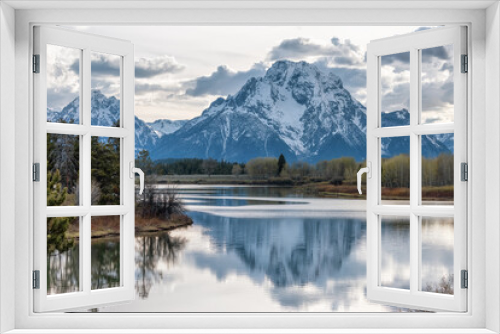 Fototapeta Naklejka Na Ścianę Okno 3D - River surrounded by Trees and Mountains in American Landscape. Snake River, Oxbow Bend. Spring Season Sunset. Grand Teton National Park. Wyoming, United States. Nature Background.