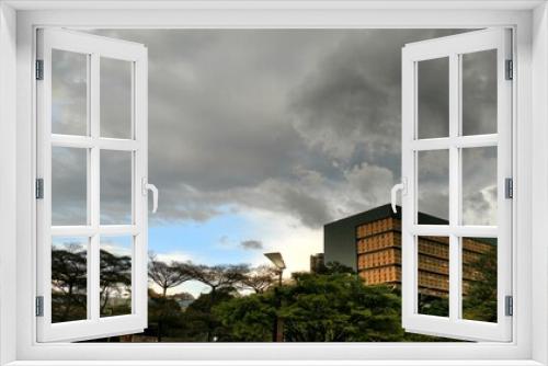 Fototapeta Naklejka Na Ścianę Okno 3D - clouds over city
