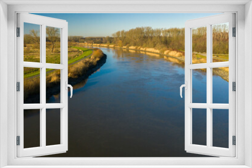 Fototapeta Naklejka Na Ścianę Okno 3D - Aerial view of the Scheldt river, in Wichelen, Belgium