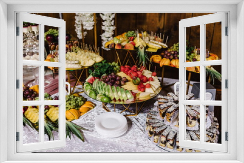 Fototapeta Naklejka Na Ścianę Okno 3D - Fresh fruit on skewers. Concept buffet for a summer party. Fruits on sticks.