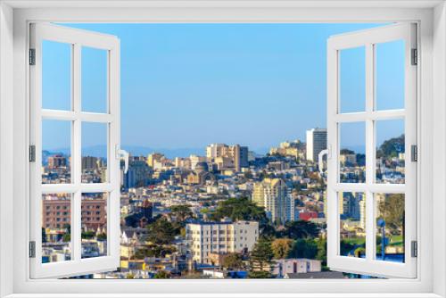 Fototapeta Naklejka Na Ścianę Okno 3D - Dense residential and financial buildings in a high angle view at San Francisco, California