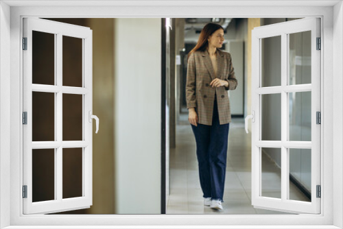 Portrait of young business woman in office