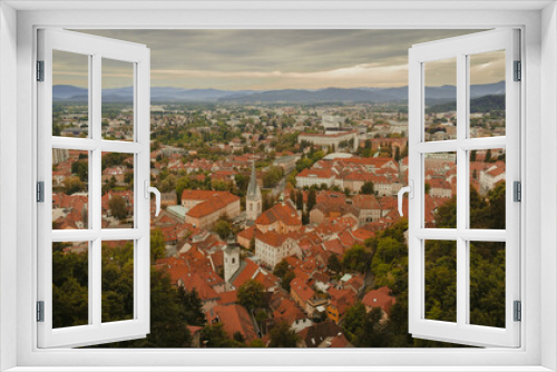 Fototapeta Naklejka Na Ścianę Okno 3D - Ljubljana, Slovenia city center view from above. Green capital of Europe, Old Castle. An aerial view drone photo.