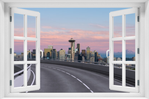 Fototapeta Naklejka Na Ścianę Okno 3D - Empty urban asphalt road exterior with city buildings background. New modern highway concrete construction. Concept way to success. Transportation logistic industry fast delivery. Seattle. USA.