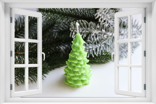 Fototapeta Naklejka Na Ścianę Okno 3D - New Year's decorative handmade candles made of natural soy wax in the form of a Christmas tree and a tangerine