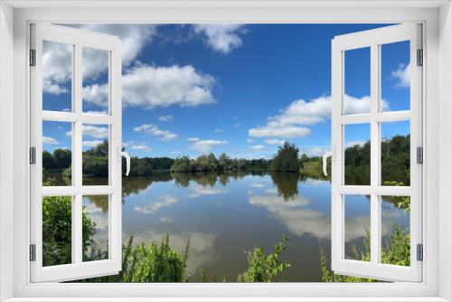 Fototapeta Naklejka Na Ścianę Okno 3D - Panorama from a lake around Broek