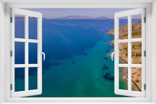 Fototapeta Naklejka Na Ścianę Okno 3D - Beautiful seashore. Islands in the distance. Colorful blue sea. The beauty of Turkey. Beautiful rocks and mountains. Sunny clear day. Beautiful water.