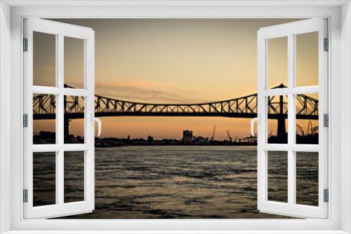 Fototapeta Naklejka Na Ścianę Okno 3D - 2022: Beautiful Sunrise in Old Port, clock tower and Jacques Cartier Bridge against sunset sky, Montreal, Canada