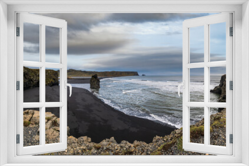 Fototapeta Naklejka Na Ścianę Okno 3D - Picturesque autumn evening view to Reynisfjara ocean  black volcanic sand beach and rock formations from Dyrholaey Cape, Vik, South Iceland. Mount Reynisfjall on the background.
