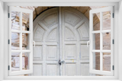 old wooden door in wall