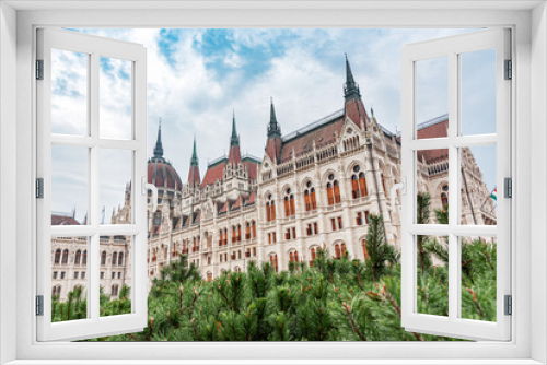 Fototapeta Naklejka Na Ścianę Okno 3D - Parliament building in Budapest. Hungary. The building of the Hungarian Parliament is located on the banks of the Danube River, in the center of Budapest.