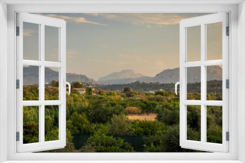 Fototapeta Naklejka Na Ścianę Okno 3D - A landscape view of the interior of the Rhodes island with mountains on a background, Greece, Europe.