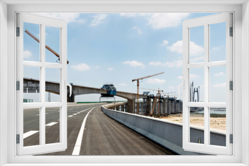 Fototapeta Naklejka Na Ścianę Okno 3D - Construction of bridge under blue sky