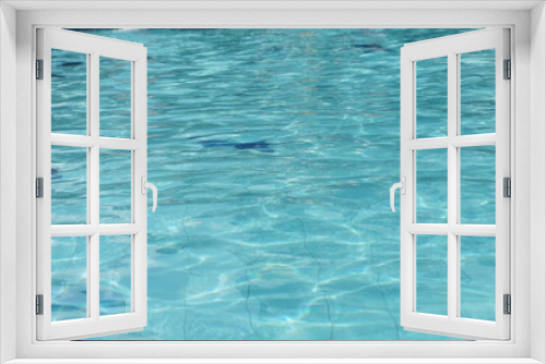 Fototapeta Naklejka Na Ścianę Okno 3D - Selective focus of clear water reflection in the swimming pool