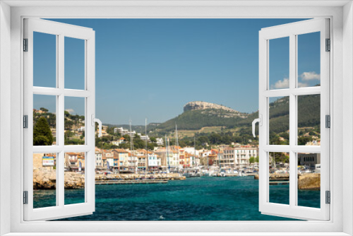 Fototapeta Naklejka Na Ścianę Okno 3D - Panoramic view on cliffs, blue sea, beach, houses, streets and old fisherman's harbour with lighthouse in Cassis, Provence, France