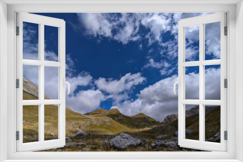 Fototapeta Naklejka Na Ścianę Okno 3D - Summer view of Val Chiarino with blue sky and clouds in Abruzzo Italy