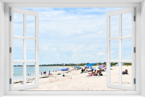 Fototapeta Naklejka Na Ścianę Okno 3D - People enjoying a sunny beach day in Vero Beach, Florida on Hutchinson Island