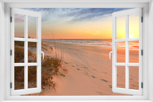 Fototapeta Naklejka Na Ścianę Okno 3D - Beautiful sunrise over Kure Beach, Kure Beach, North Carolina USA. Kure Beach is a town 15 miles south of Wilmington, North Carolina